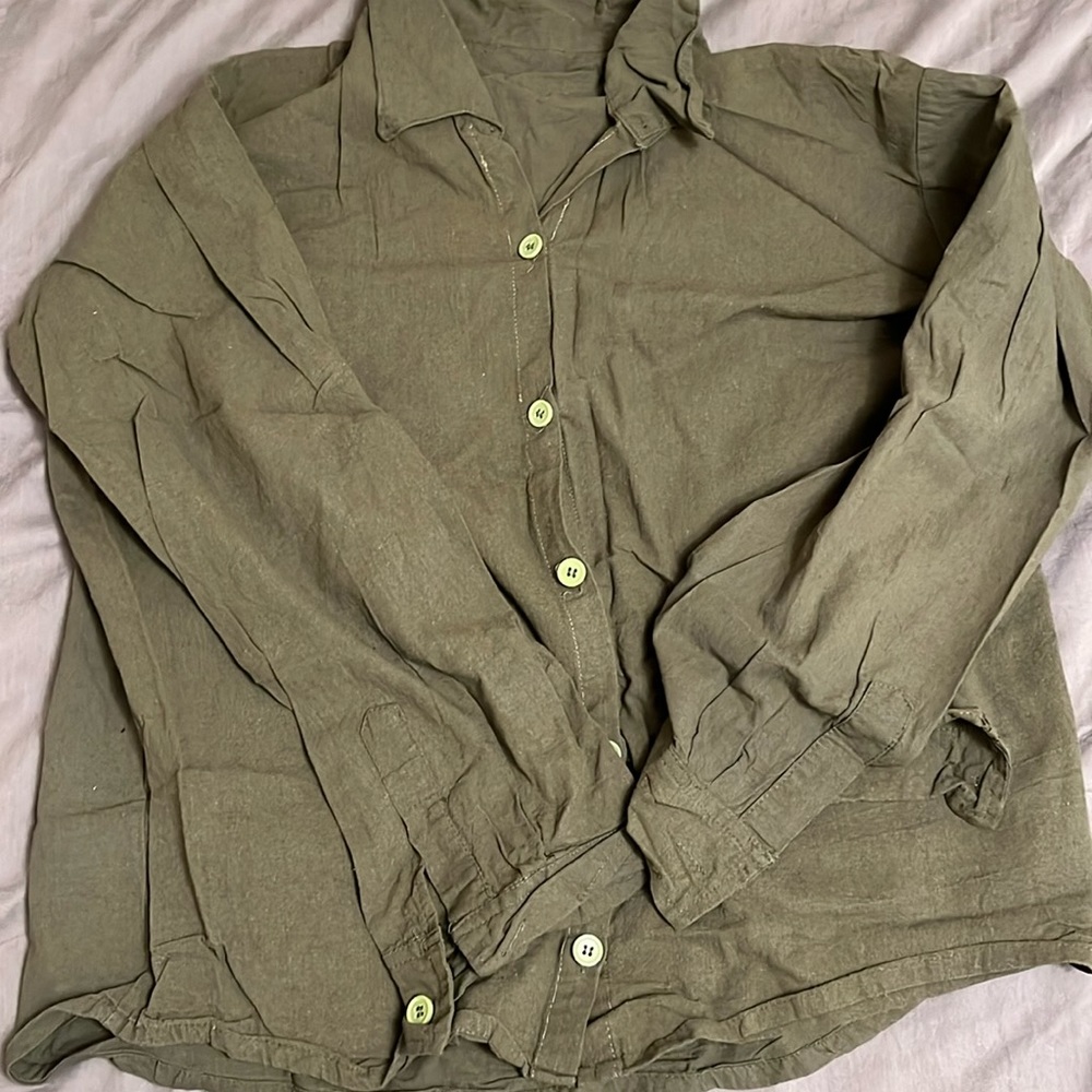 Green Long sleeves. No brand. Got it from the Philippines :)